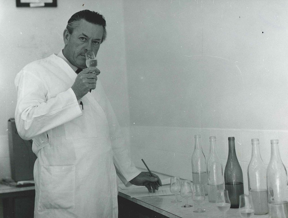 Bob Baker Evaluates Wine, c1980