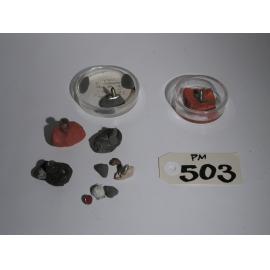 Metal Items Housed in Putty