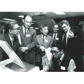 Peter Glow and Hoo Li with International Delegation, c1983