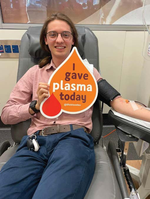 Student Trent Heaver giving as part of the Tri-Society Blood Drive